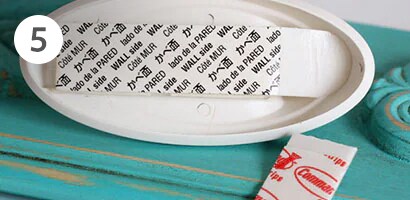 Back of the Command™ Quartz Terrace Hooks with adhesive strips
