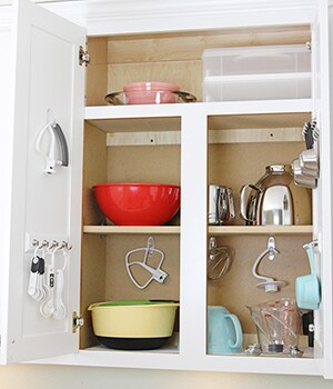 Hang sets of measuring spoons and cups on the key rails, and use the clear hooks to hold plastic mixers, tools, whisks and more
