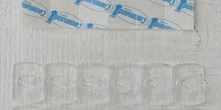 step 2 of easter décor display – applying the strips of the decorating clips
