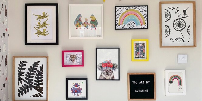 frame hangers to display children’s artwork
