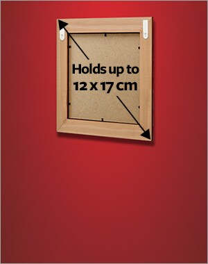 A frame holding a maximum size of 12x17cm using 2 sets of small picture hanging strips.