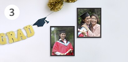 DIY decor ideas for graduation party featuring banner and garlands
