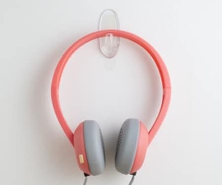 Headphones hung using Command non-damaging wall hangers
