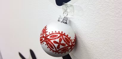 Step 2 of decorating with sticker wall Christmas tree

