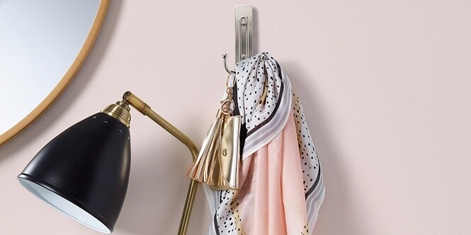 Hallway wall: Lightweight coat, purse and scarves hung on a Command ™ hook.

