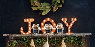 add additional holiday décor such as garland on the mantel