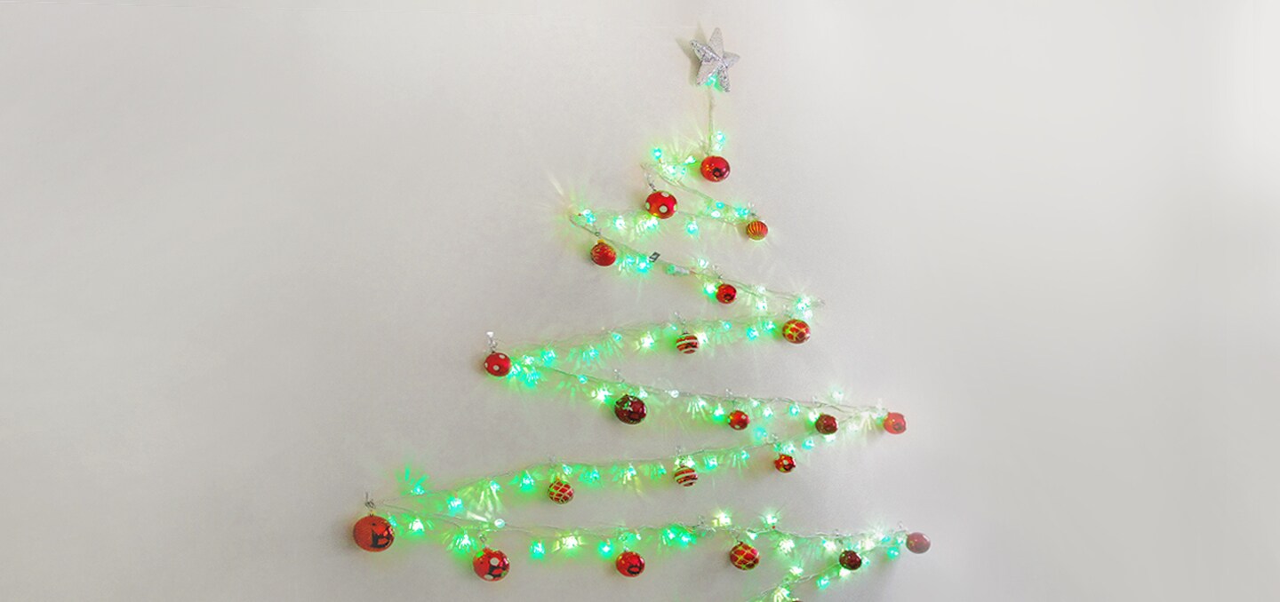 fairy light wall christmas tree 

