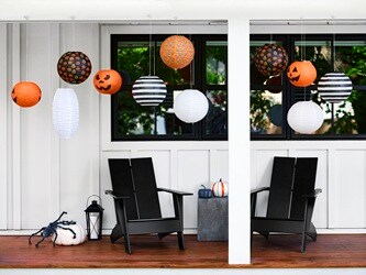 DIY outdoor Halloween decorations by the front door hung using the weather-resistant Command™ Outdoor Light Clips
