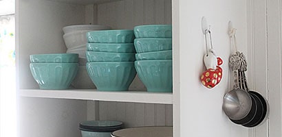 Step 2 using adhesive kitchen hooks for organising
