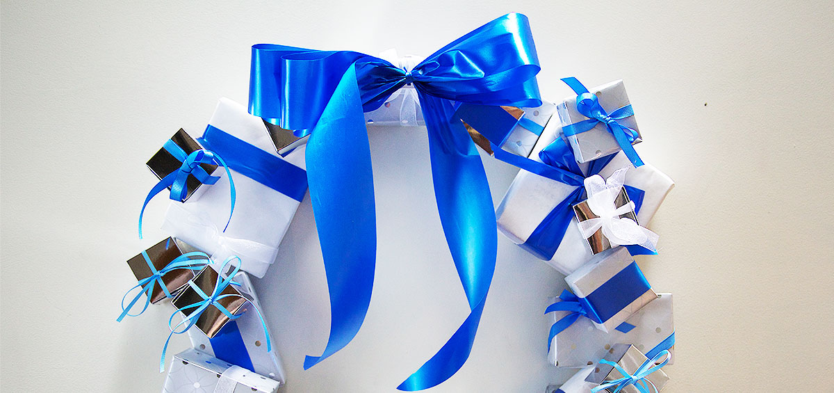 Step 5 of making your holiday gift wreath
