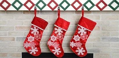 Hang Christmas stockings with Command metal hooks 
