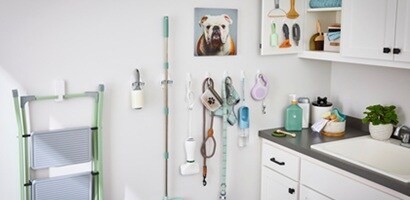 Hang everyday pet essentials like treat pouches and dog leashes with wall hooks from Command
