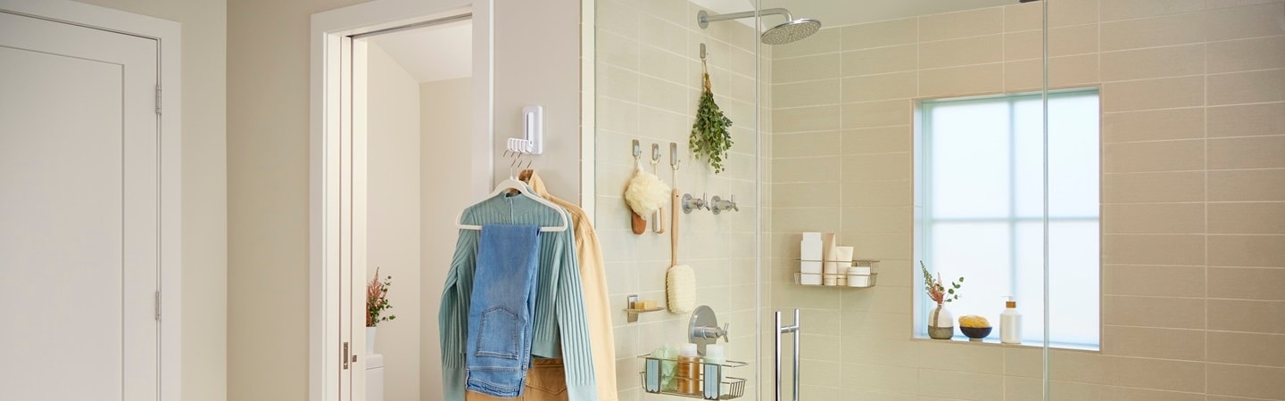 Command folding clothes hanger installed near the bathroom door
