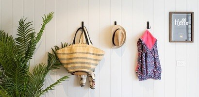 Entryway drop zone with Command™ hooks for bags, hats and jackets
