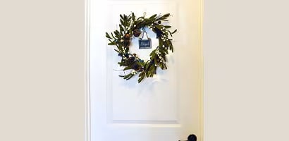 Step 4 of decorating your holiday door
