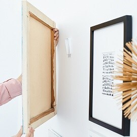 hanging a frame using Command™  Picture Hanging Strips
