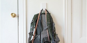 Bags and jackets hung using a Command Heavyweight Hook

