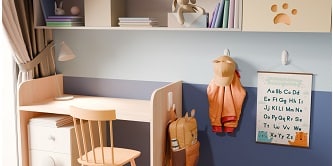 A child's backpack, hat, jacket, and calendar are well-organised with Command hooks
