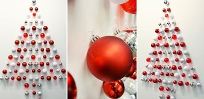 create a Christmas wall tree using ornaments and Command decorating clips