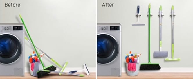 Cleaning supplies are well-organised on the wall with Command broom grippers
