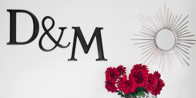 cutout letters hung using command picture hanging strips
