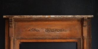 prepare a wooden shelf in front of a painted wall