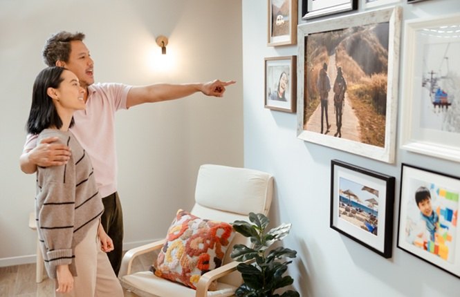 A gallery wall within the dining room, featuring inspiring and funny quotes and pretty photos. Displayed with the help of Command Picture Hanging Strips
