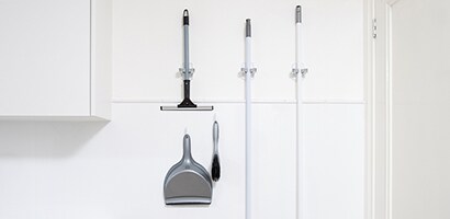 Broom and Dustpan Storage Idea for Quick Clean-ups