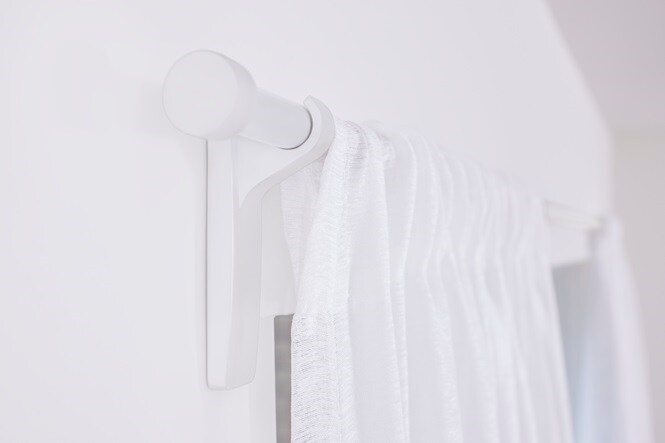 Curtain hung with heavy duty metal curtain hooks
