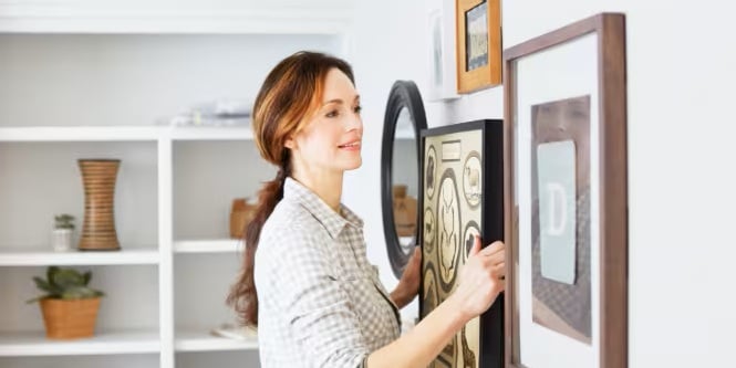 Hanging artworks without nails using Command™ picture hangers.
